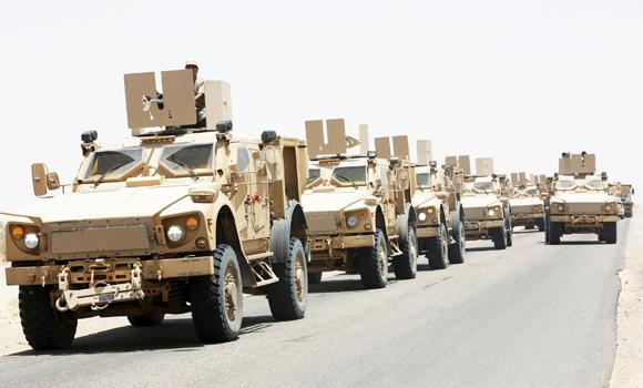 Military vehicles carrying Gulf Arab soldiers arrive at Yemen's northern province of Marib on Tuesday. (Reuters)