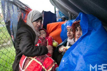A women with her child in the Croatia-Slovenia border