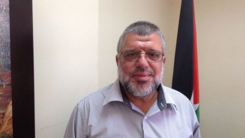 Hamas official Hassan Yousef at his office in Ramallah, July 30, 2015