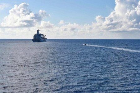 USS Lassen destroyer sailing inside what China claims as a 12-nautical mile (22-kilometer) territorial limit around Subi Reef in the Spratly Islands archipelago