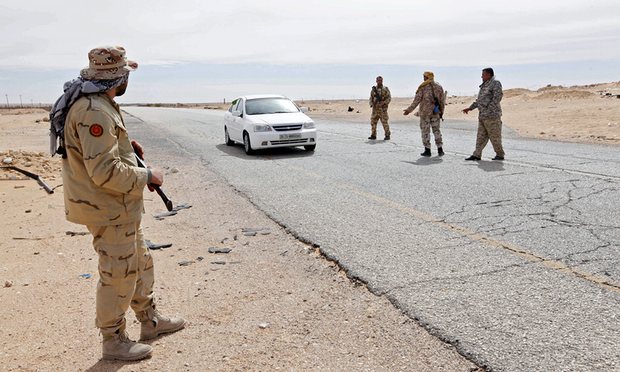 Libyan soldiers at a military outpost west of the city of Sirte, Isis’s stronghold in the country. Photograph: Ismail Zetouni/Reuters