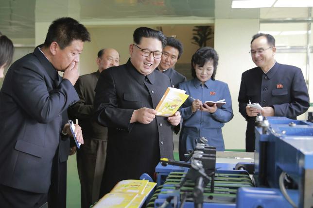 North Korean leader Kim Jong Un gives field guidance during his visit to the newly built Mindulle Notebook Factory in this undated photo released by North Korea's Korean Central News Agency (KCNA) in Pyongyang on April 19, 2016. KCNA/ via REUTERS