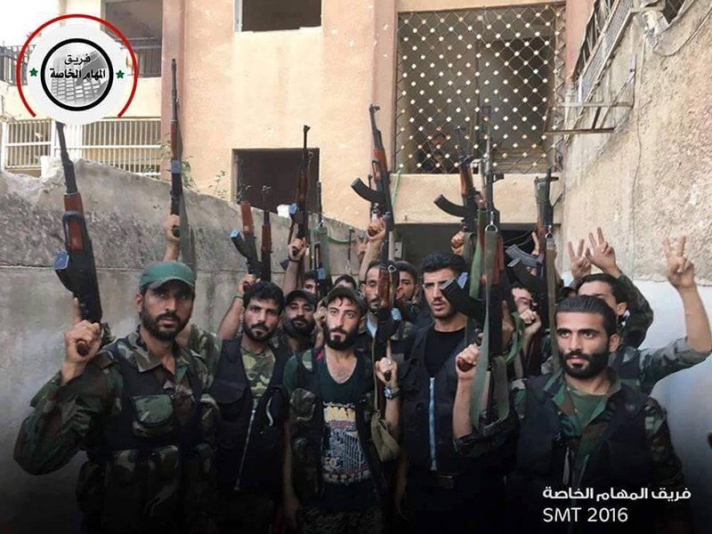Soldiers from the 4th Mechanized Division pose for a final picture before conducting their offensive tonight