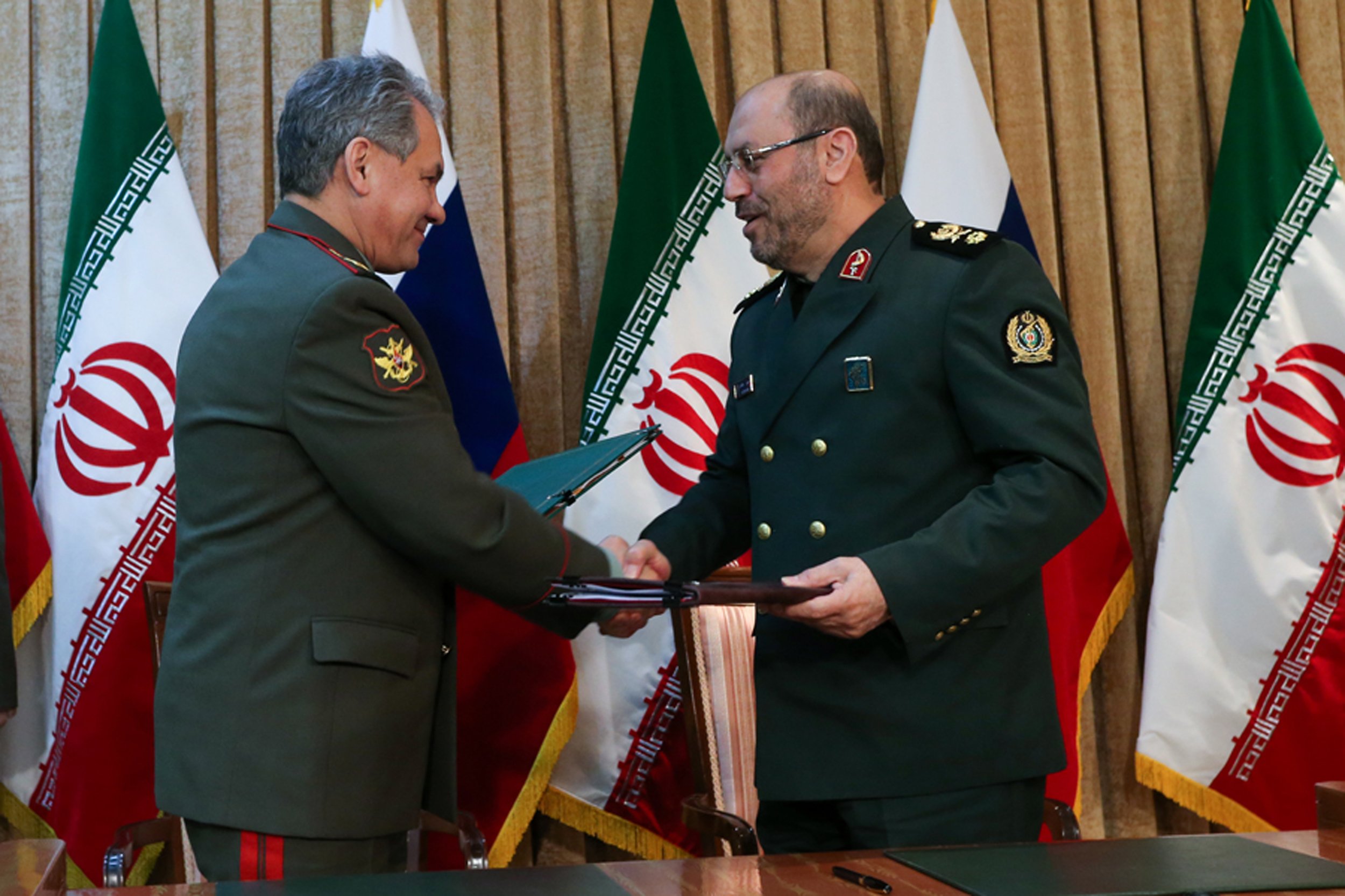 Jan. 20, 2015 Russia's Defense Minister Sergei Shoigu, left, and Iran's Defense Minister Hossein Dehghan (AP Photo/ Vadim Savitsky, Russian Defense Ministry Press Service)