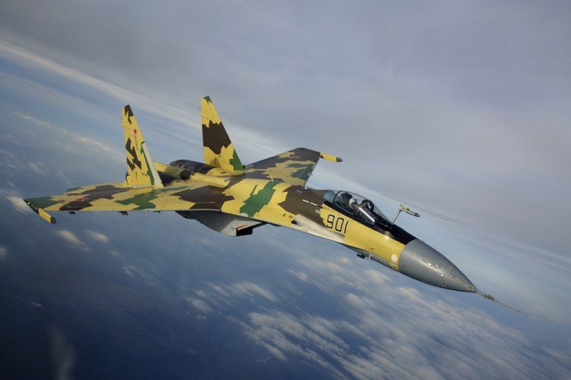 Russian air force Su-35. Sukhoi photo. At top — Russian air force MiG-35. Russian Aircraft Corporation photo
