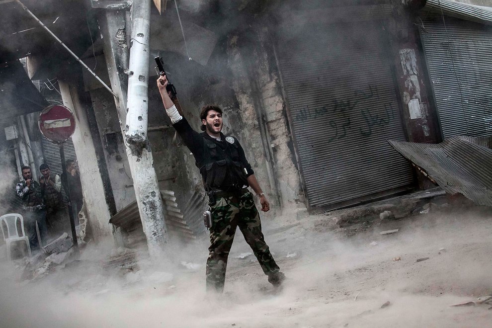 Syrian militant (Narciso Contreras/Associated Press)