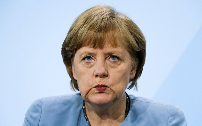 German Chancellor Angela Merkel reacts at a news conference after an energy "summit" with German state premiers at the Chancellery in Berlin...German Chancellor Angela Merkel reacts at a news conference after an energy "summit" with German state premiers at the Chancellery in Berlin May 23, 2012.    REUTERS/Fabrizio Bensch (GERMANY - Tags: POLITICS ENVIRONMENT HEADSHOT TPX IMAGES OF THE DAY)
