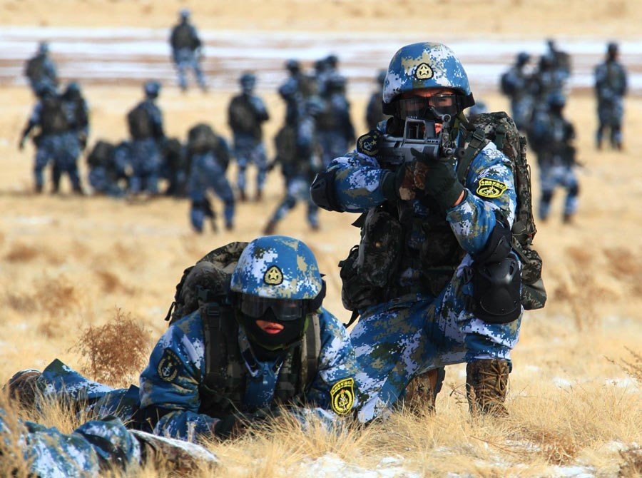PLA Marines train in all environments and conditions. Above: PLA Marine exercises carried out in snow covered tundra in 2015.
