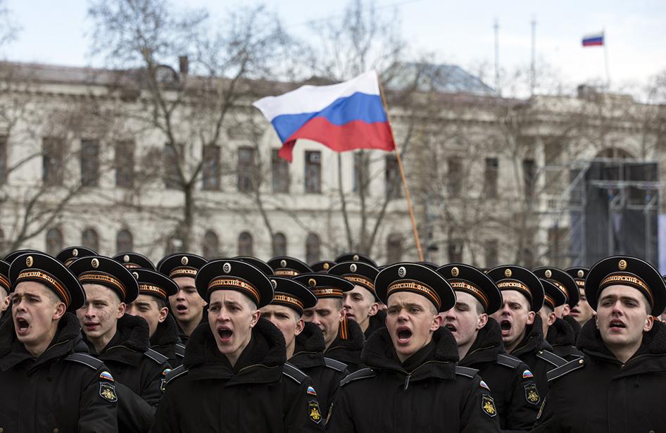 Russian naval forces participate in a festive ceremony marking the first anniversary of the signing of the Treaty for Adoption within the Russian Federation of the Independent Republic of Crimea. Sevastopol, March 18, 2015.