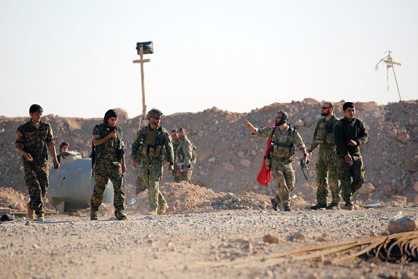 YPG fighters and US soldiers side by side in the Raqqa offensive