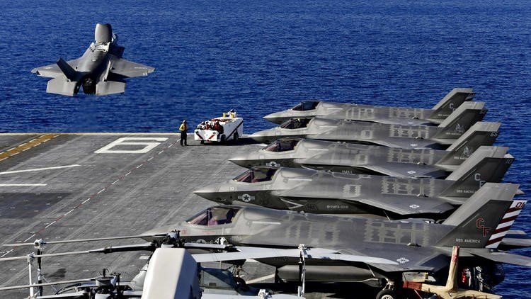 F-35B JSF Vertical/Short Take-off and Landing aircraft operating from the flight deck of the USS America LHA-6 during training exercises.