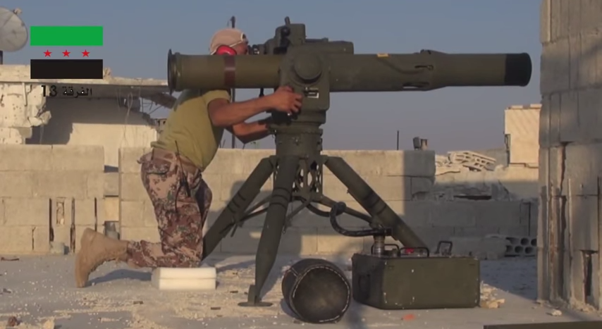 A member of the Free Syrian Army's 13th Division uses a US-made TOW missile.