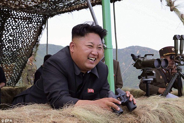 North Korean leader Kim Jong-un (centre) attending a live-fire drill by a North Korean artillery unit near the eastern border with South Korea. Source: EPA