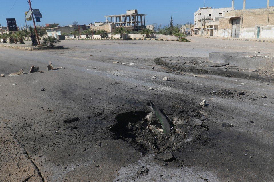 A crater is seen at the site of an airstrike, after what rescue workers described as a suspected chemical attack in Khan Sheikhoun in Syria’s Idlib province. Source: Ammar Abdullah / Reuters