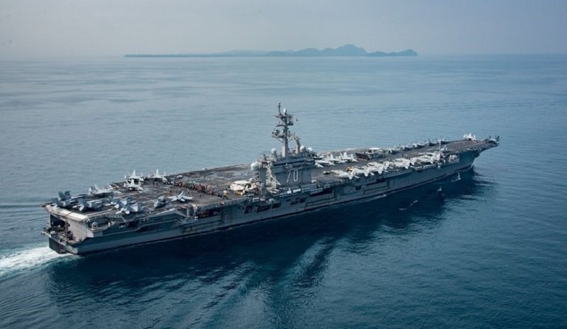 SUNDA STRAIT (April 15, 2017) The aircraft carrier USS Carl Vinson (CVN 70) transits the Sunda Strait. The Carl Vinson Carrier Strike Group is on a scheduled western Pacific deployment as part of the U.S. Pacific Fleet-led initiative to extend the command and control functions of U.S. 3rd Fleet. U.S Navy aircraft carrier strike groups have patrolled the Indo-Asia-Pacific regularly and routinely for more than 70 years. (U.S. Navy photo by Mass Communication Specialist 2nd Class Sean M. Castellano/Released)