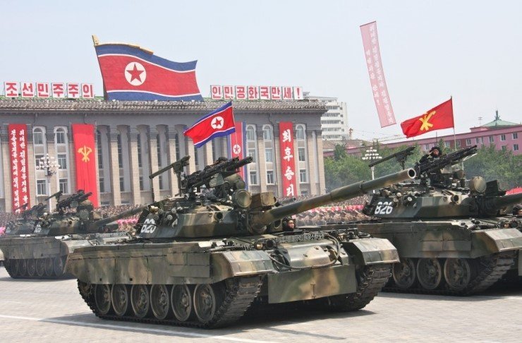 Pokpung-ho III MBTs on parade in Pyongyang. Note the provision of a MANPAD and two ATGMs on the top of the turret. The addition of armor to the T-62 hull and turret front are clearly visible.