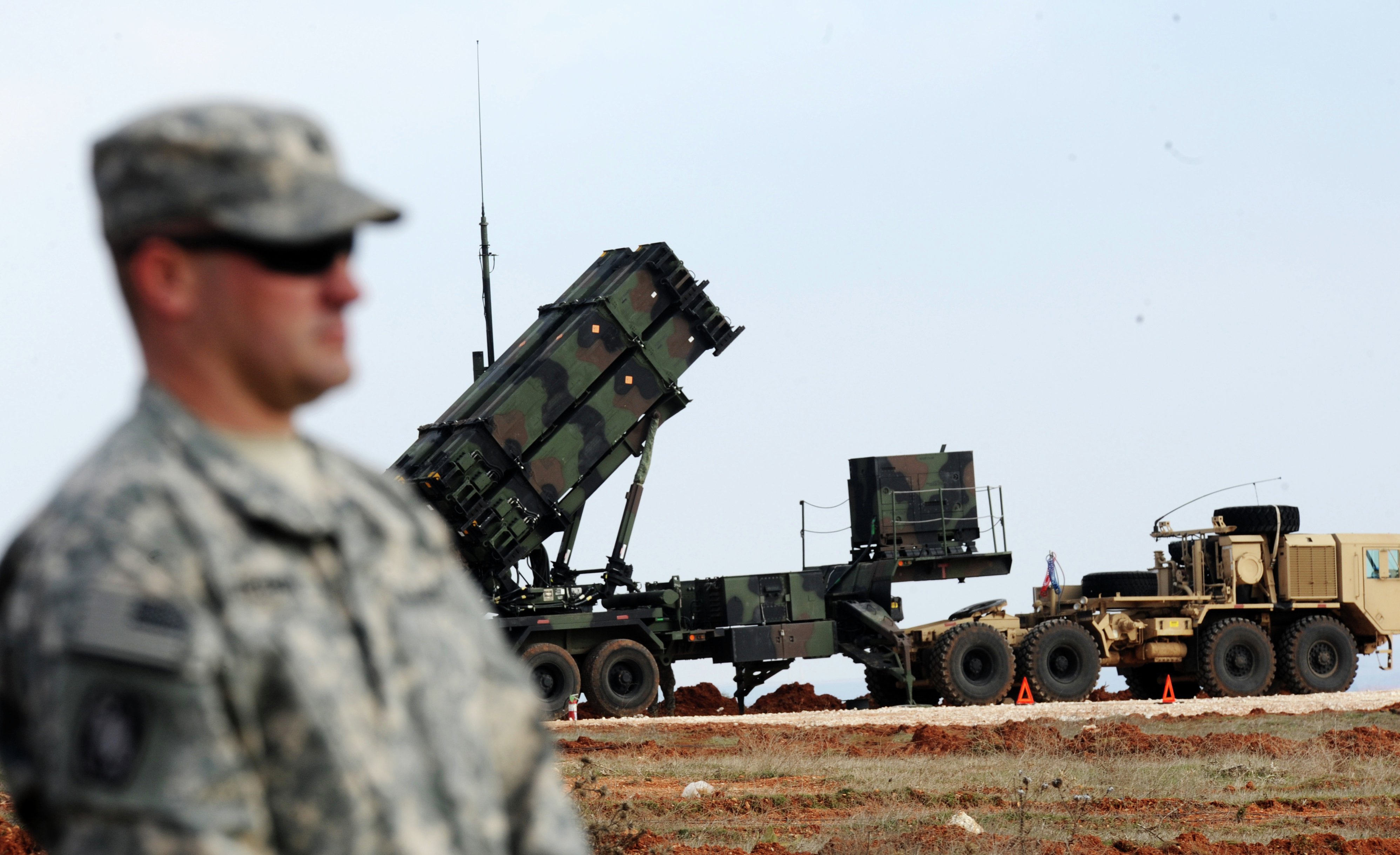 A US soldier stands in front of a Patriot missile system at a Turkish military base in Gaziantep on February 5, 2013. Source: AFP 2017/ BULENT KILIC