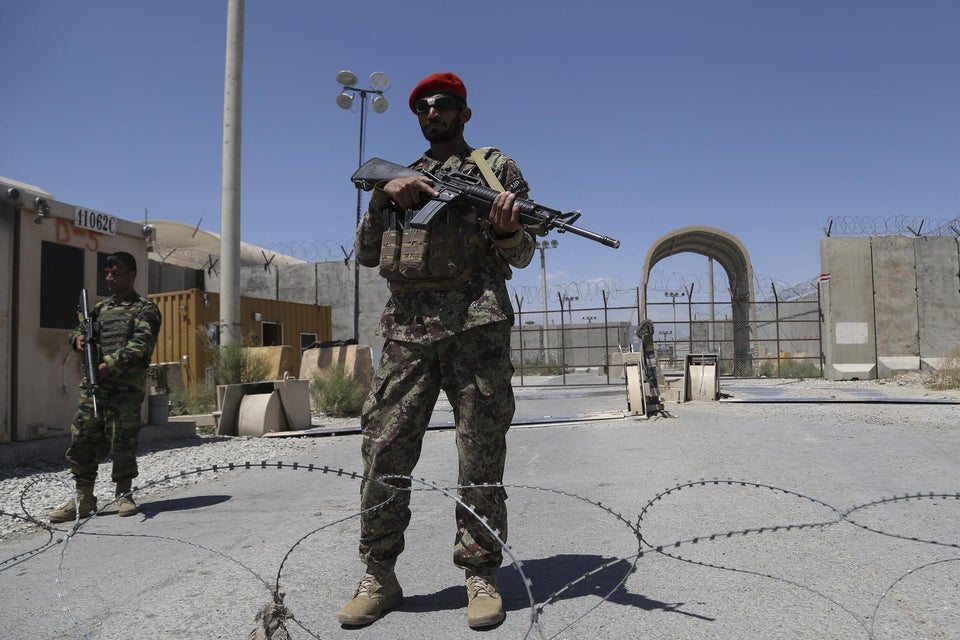 An Afghan National Army (ANA) soldier stands guard at Bagram Air Base, after the departure of all U.S. and NATO troops. ZAKERIA HASHIMI/Getty Images